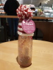 Innocent smoothie bottle wearing little woolly hat